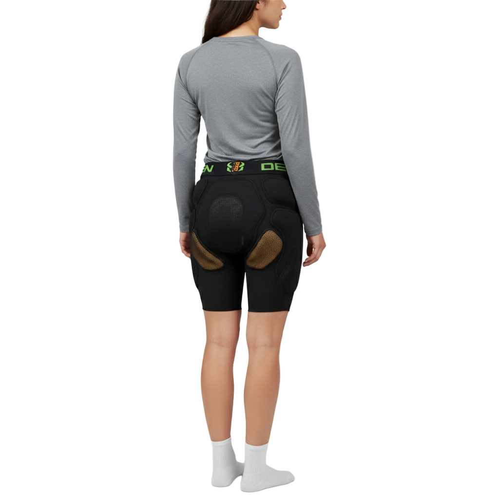 Person wearing black cycling shorts with a visible brand logo