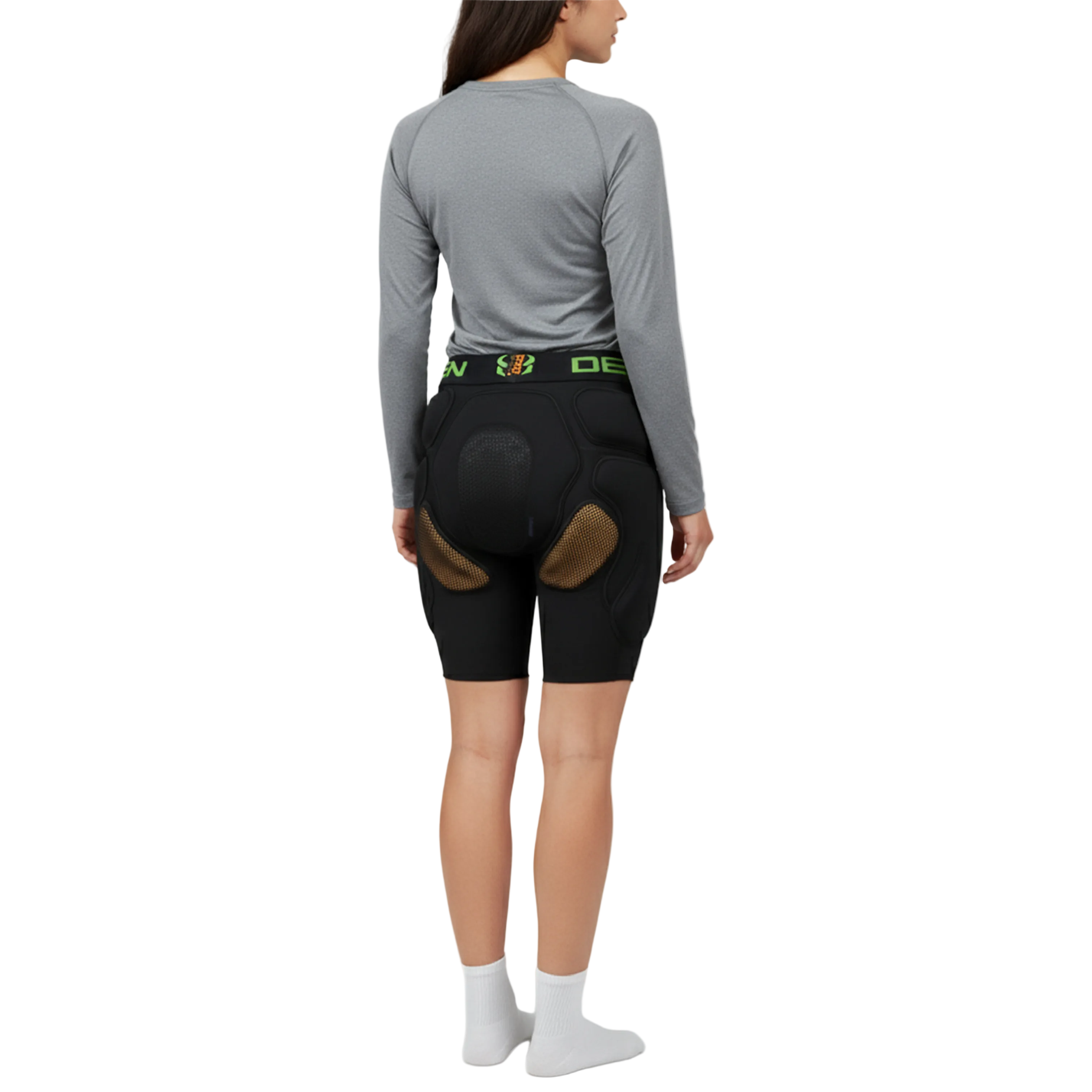 Person wearing black cycling shorts with a visible brand logo