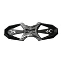 Dual- toned Quattro Hybrid Stomp Pad with black outer frame and silver x shaped center- piece with white "DEMON" logo