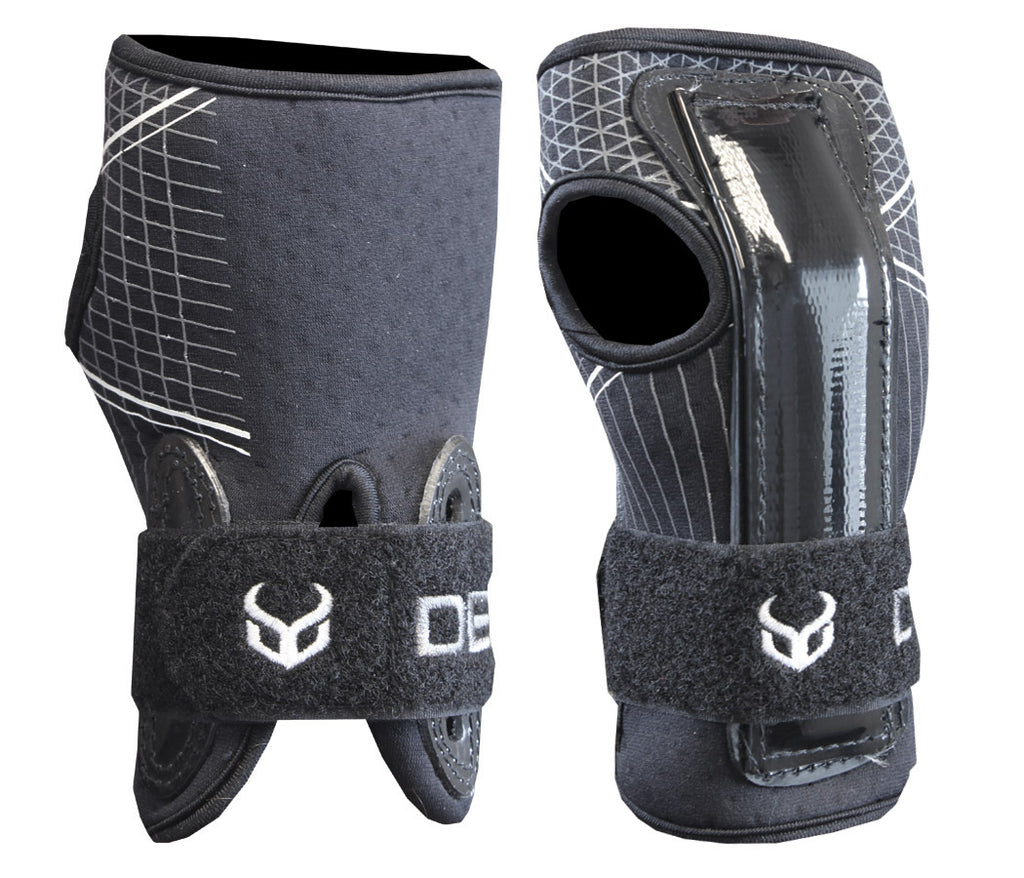 A pair of black wrist guards with green accents, featuring an adjustable neoprene cuff and an aluminum brace bar, labeled 'Demon'.